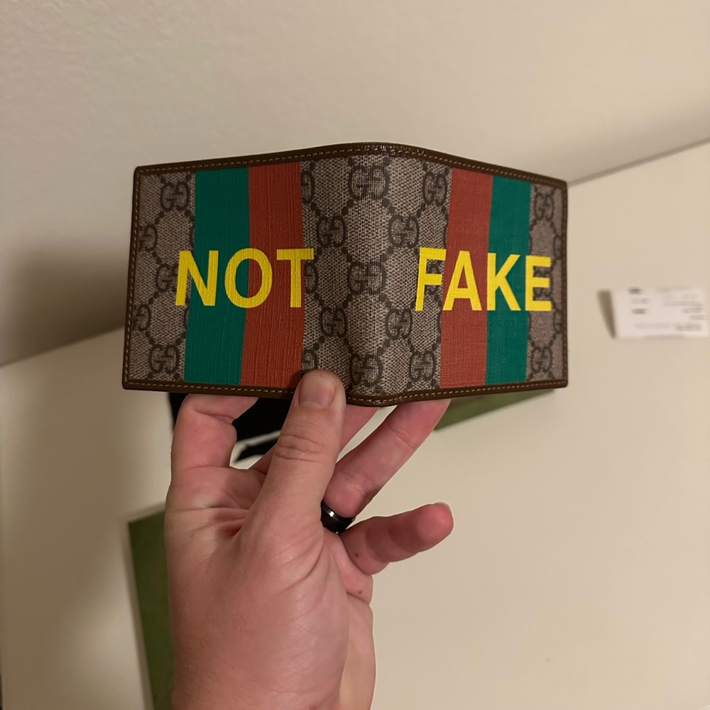 Gucci “NOT FAKE” Bi-Fold Wallet.